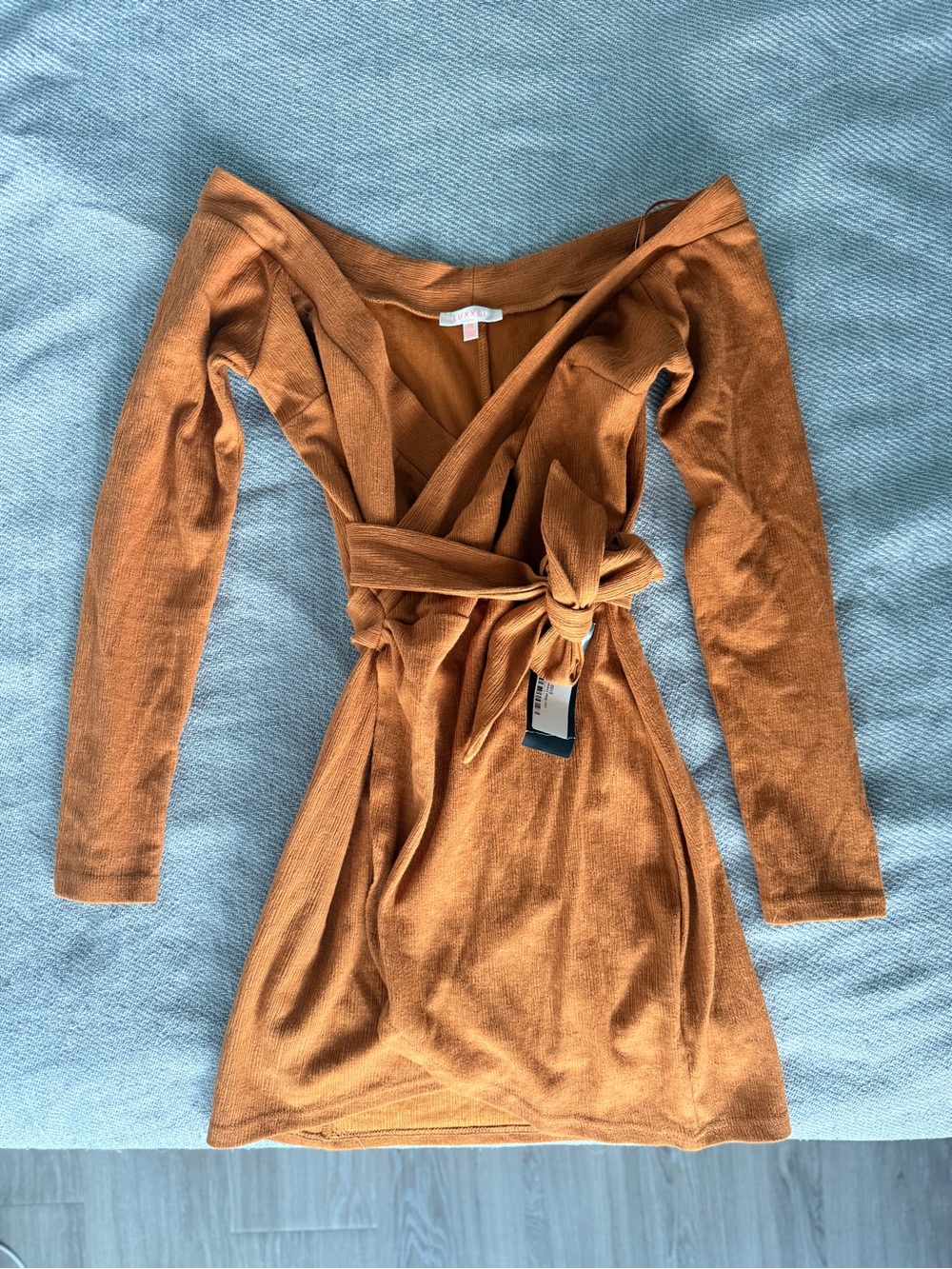 Off the shoulder wrap style mini dress